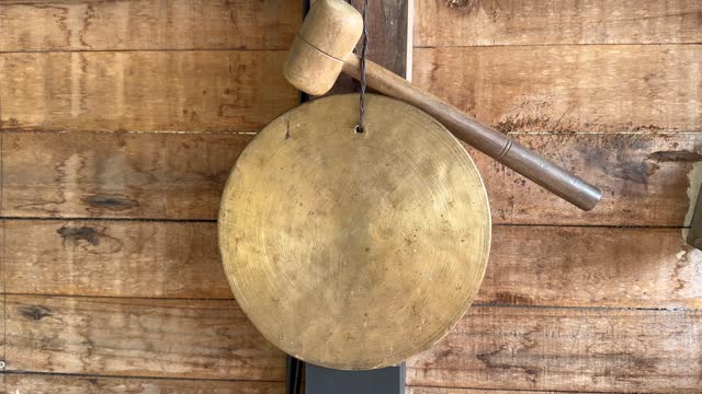 Traditional Bell Close-up. Sub continental Brass made school bell with wooden hammer. Pure Brass Bell Ghadiyal Ghanta For Temple Aarti School Bell With Hammer Stick