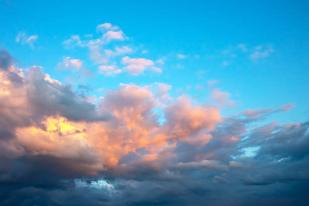 istock Lush colored clouds in the sky before sunset 2124914854
