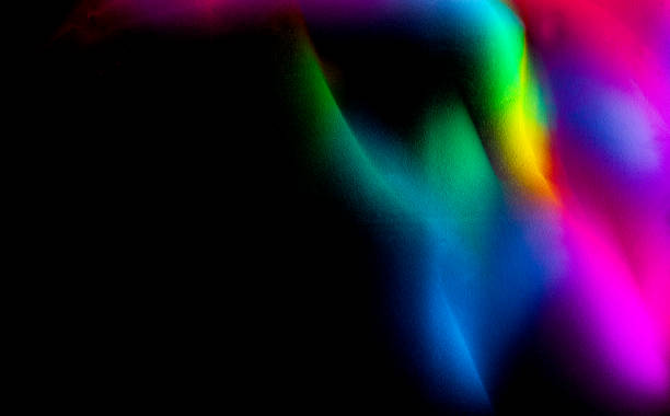 istock Abstract rainbow on textured black background. Long exposure. Light painting photography. 2124922713