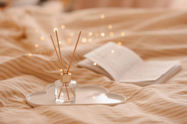 istock Cozy home atmosphere with liquid fragrance in bed 2124940667