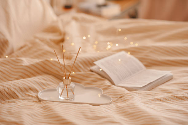 istock Cozy home atmosphere with liquid fragrance in bed 2124940668