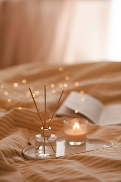 istock Cozy home atmosphere with liquid fragrance in bed 2124940670