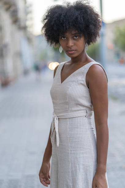istock Woman looking curiously at the camera 2124953553