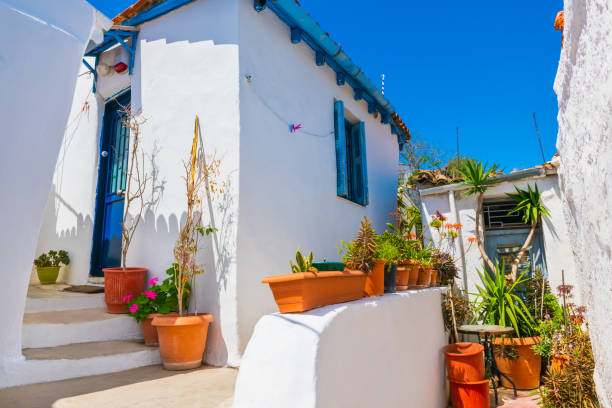 istock Athens, Greece. Street with white cycladic architecture in Plaka district. 2124980046