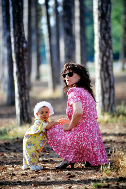 young mother walks with baby