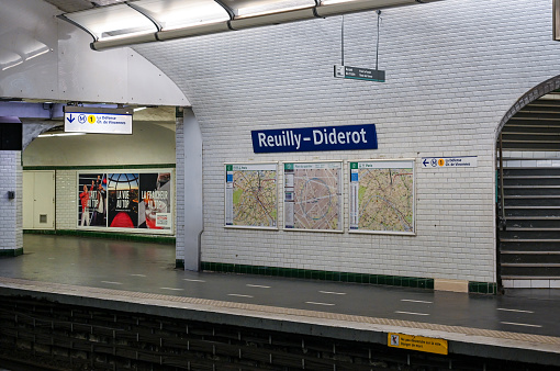 Paris, France, June 30, 2022. At the Reuilly - Diderot metro stop, the sign with white writing on a blue background is highlighted.