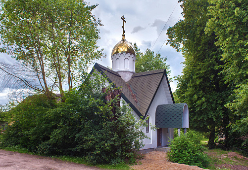 View of the the small orthodox chapel of St. George the Victorious, built in 2013-2014 in the village of Krasnolesye (former Gross-Rominten) in the Kaliningrad region, Russia