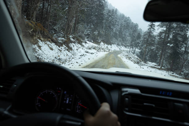 istock Driving car on high altitude mountain trail, China 2125118690