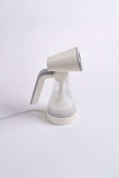 istock Hand steamer for clothes isolated on a white background 2125131411