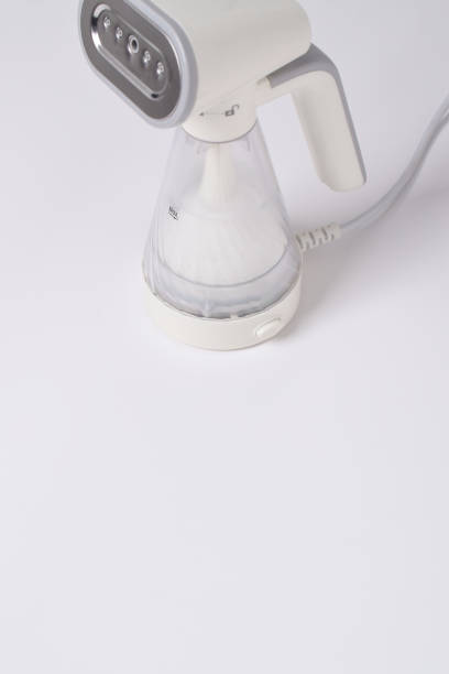 istock Hand steamer for clothes isolated on a white background 2125131946