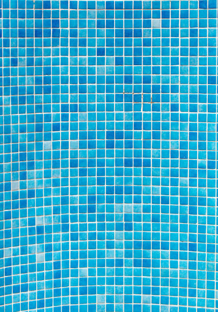 istock Small blue tile tiles on the wall. Texture 2125211142
