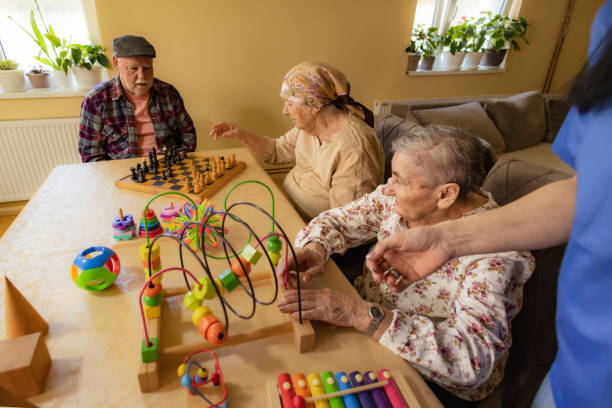 istock Nurse Supervising Senior Chess 2125214307