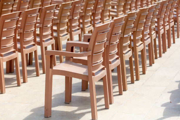 photo of chairs arranged by the pool