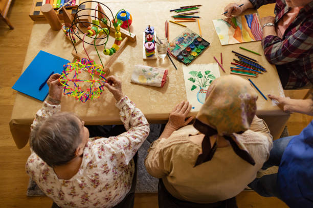 Seniors coloring in nursing home