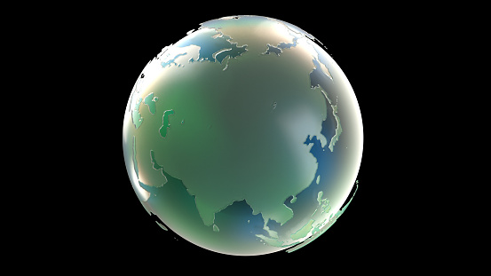 Earth with blue reflection of green glass illuminated by light. Abstract overlay multicolor background. Can be used as a texture or background for design projects, scenes, etc. \nJapan, Indonesia, Australia, Europe, Asia