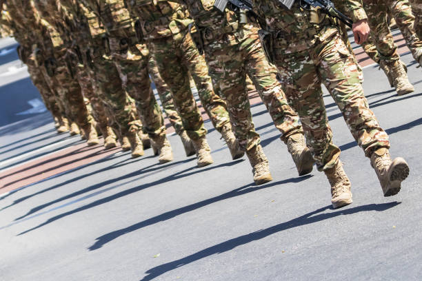 istock Soldiers in military camouflage uniform 2125276729
