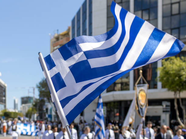 Athens, Greece July 5th, 2015: The Greeks are celebrating the results of the Greek referendum in Syntagma square. Greeks are being asked to vote on whether to accept a proposal by the country's creditors for more austerity to keep aid flowing.