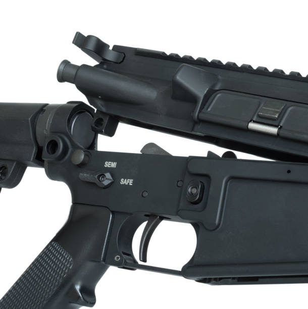 istock Receivers rotating apart in an AR-15 2125318284