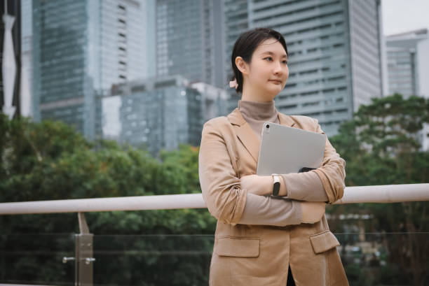 istock Confident Professional with Tablet in Urban Setting 2125385722
