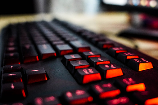 Immerse yourself in the intricate details of computer technology with this captivating close-up of keyboard keys.