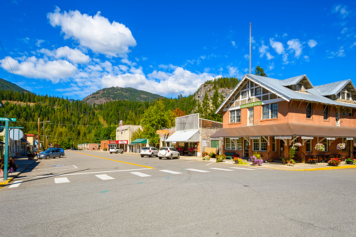 The main street shops and businesses of the rural town of Metaline Falls, Washington, USA, in Pend Oreille county near the USA and Canadian border at summer.