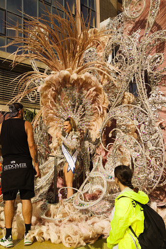 Las Palmas de Gran Canaria, Spain - February 17 2024: Last preparations are made to costumes and makeup before grand carnival procession