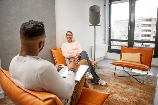 istock Two office colleagues at an informal sit down meeting 2125542414