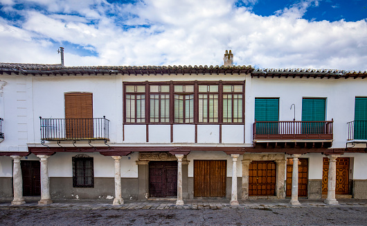 Typical porticoed houses located in the Plaza Mayor of Almagro, Ciudad Real, Castilla La Mancha, Spain