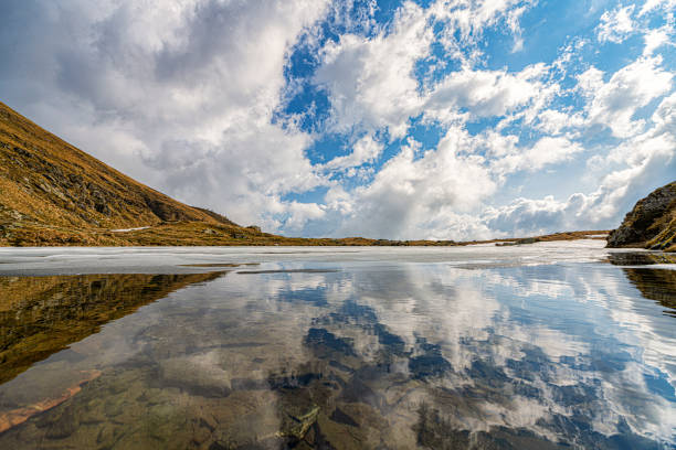 Lago Dosso, mountain lake near San Bernardino, Canton Grigionim Switzerland, at evening
