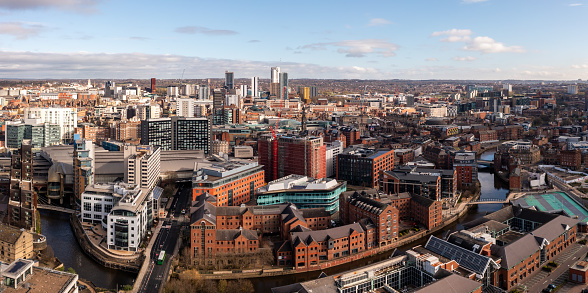 Brewery Wharf, Leeds, UK - March 29, 2024. An aerial panoramic view of Leeds city centre with the Leeds to Liverpool canal running through Robert's Wharf