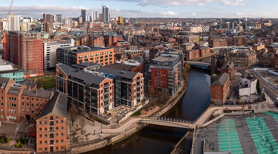 Brewery Wharf, Leeds, UK - March 29, 2024. .  An aerial panoramic view of Leeds city centre with the renovated old warehouses providing luxury apartments along the Leeds to Liverpool canal running through Brewery Wharf