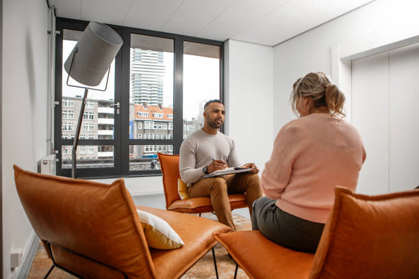 istock Two office colleagues at an informal sit down meeting 2125636568