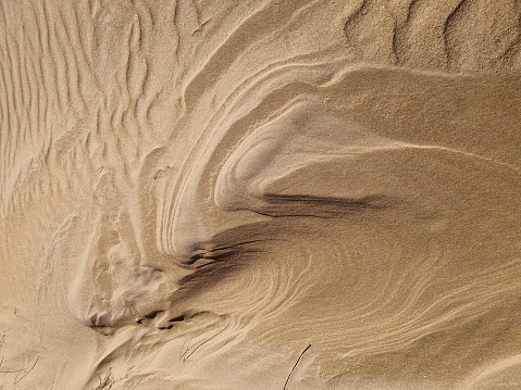 High angle, panoramic view of an empty desert at the sunrise with copy space