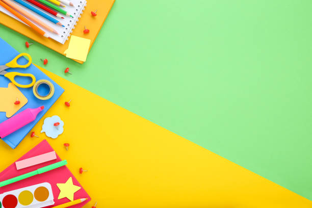 istock Different school supplies on colorful background 2125757040