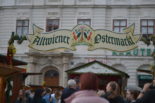 Austria, Vienna - 30.03.2024: Easter market in Freyung, Am Hof. Altwiener Ostermarkt. People visit the fair before the holiday.