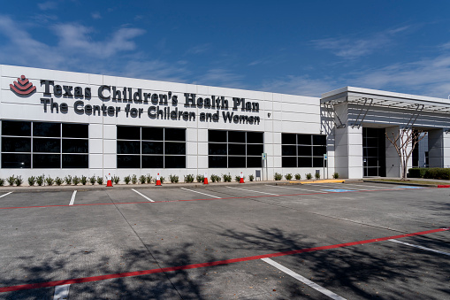 Houston, TX, USA - March 2, 2022: Texas Children’s Health Plan (CHIP)’s The Center for Children and Women office in Houston, TX, USA. CHIP offers low-cost health coverage for children.