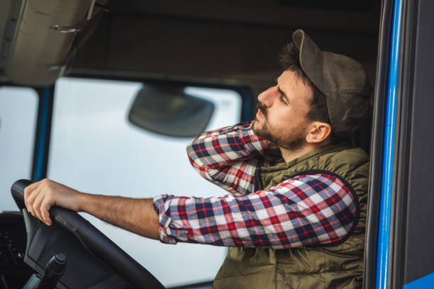 istock A truck driver's neck hurts from a long drive 2125859228