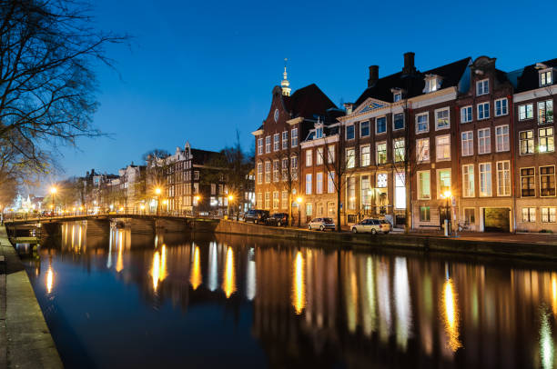 istock Tranquil canal scene in Amsterdam 2125936541