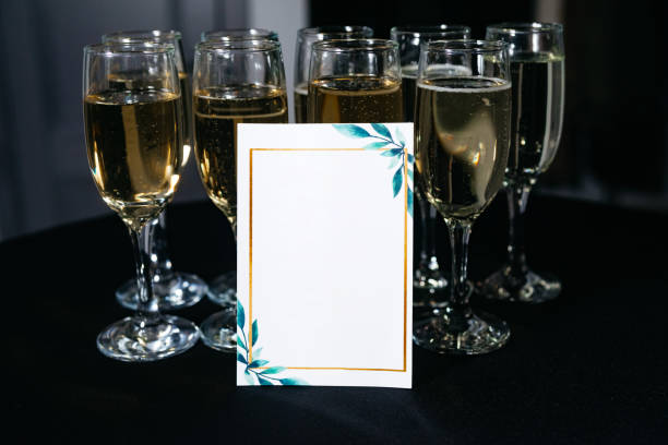 istock Elegant Champagne Flutes and Invitation Card 2126160698