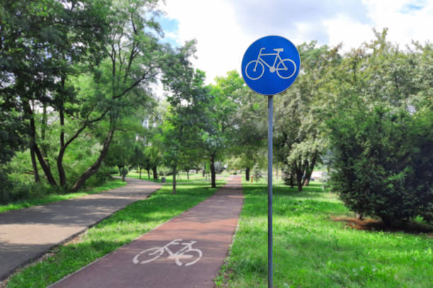 istock Bicycle path in a summer city park. 2126173302