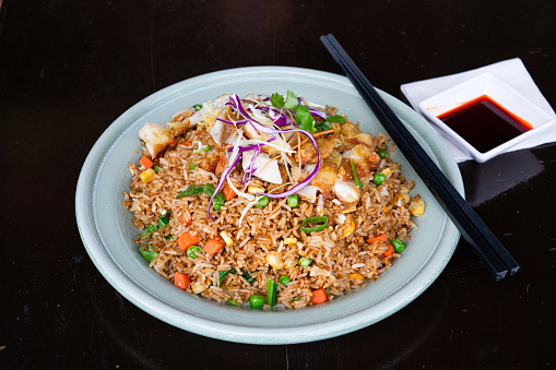 Mouth Watering Chicken Chop Stir Fried Rice with sauce.