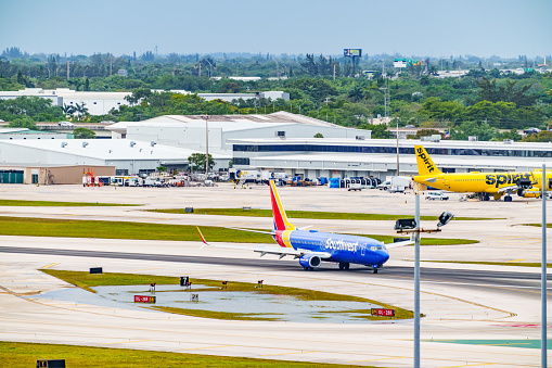 Fort Lauderdale, FL, USA - March 22, 2024:Photo of Southwest airplane taxxing on FLL runway