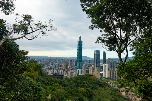 Taipei, Taiwan-December 15, 2023:This is a view from the Elephant Mountain trail of downtown Taipei and the Taipei 101 skyscraper. The trail is a popular scenic spot to capture the city landscape and serves as a tourist attraction.