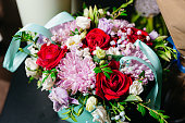 Elegant Bouquet with Red Roses and Pink Blooms