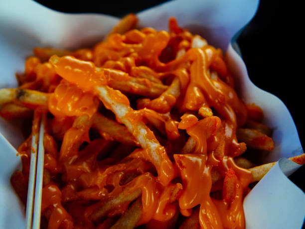 istock french fries with cheese 2126453424