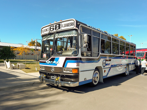 Avellaneda, Argentina - May 8, 2022: Old Mercedes Benz OH 1320 frontal bus 1997 for public passenger transport in Buenos Aires at a classic car show in a park.