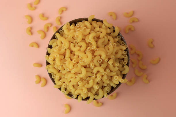 istock Raw Dried Elbow Macaroni for Cooking Pasta 2126507480