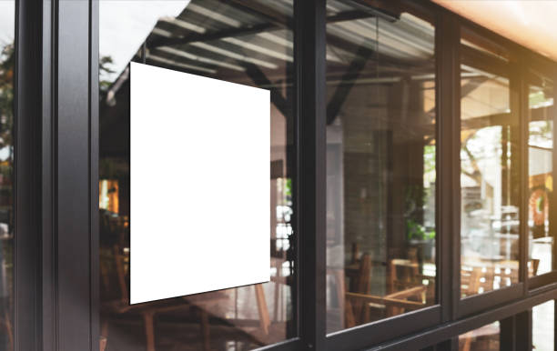 White paper poster mockup displayed outside the building restaurant. Marketing and business concept. White paper poster mockup displayed outside the building restaurant. Marketing and business concept. poster stock pictures, royalty-free photos & images