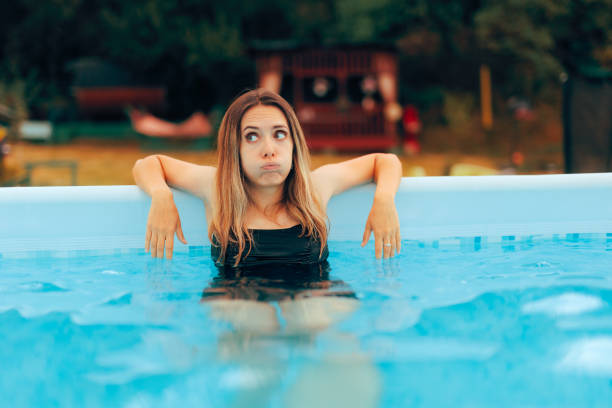 Unhappy girl spending summer vacation by herself suffering from boredom