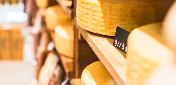 istock whole cheese are in cheese factory 2126675231